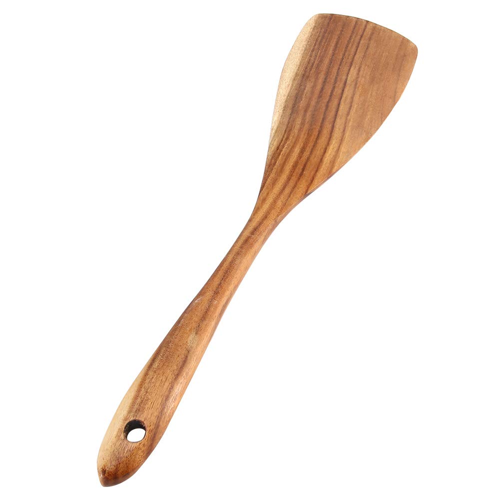 Reverse face of a cooking turner with a long handle and circular hanging hole